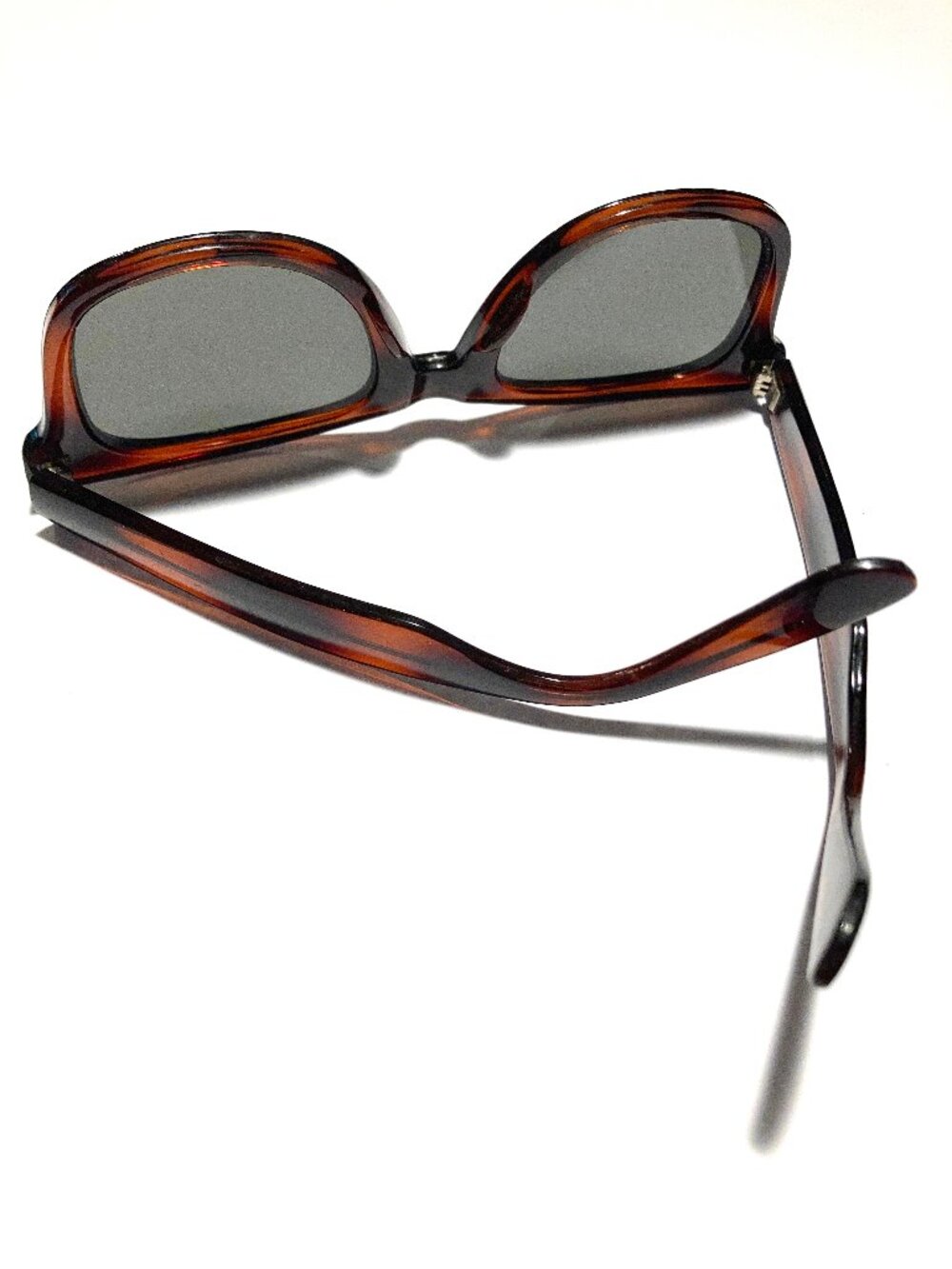 Sunglasses with Tortoise Frames and Green Lenses